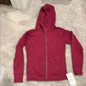 NWT Lululemon scuba full zip hoodie. Size 10 Pomegranite